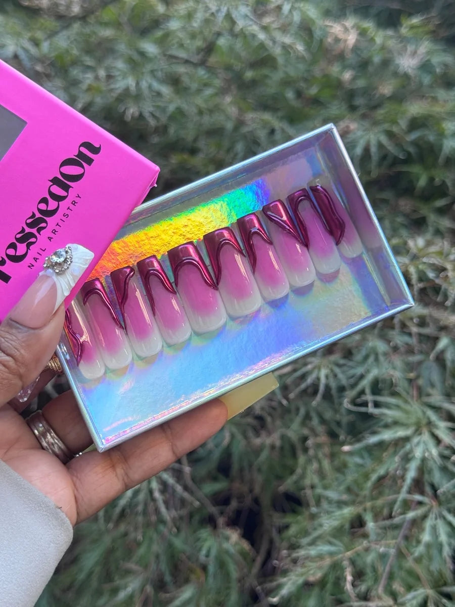 Vibrant length press-on nails with a French tip design. The nails have a pink ombre fading to a white base and are outlined with shiny magenta chrome.